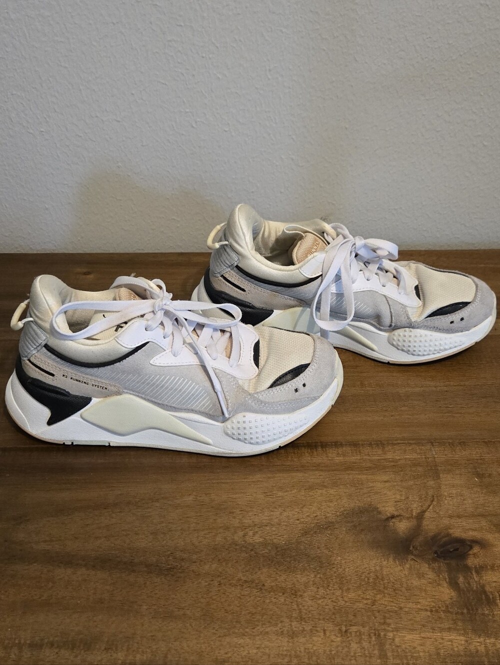 Puma white, black, grey, and cream Running sneakers
